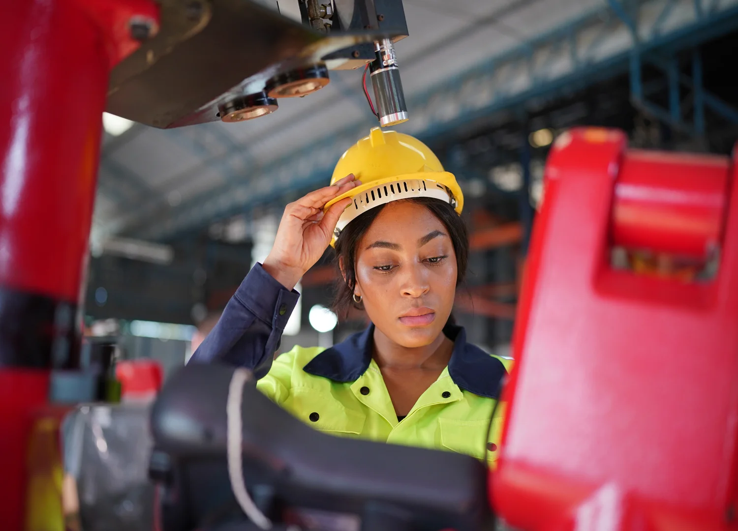 technician performing a task with the help of a corrective maintenance software