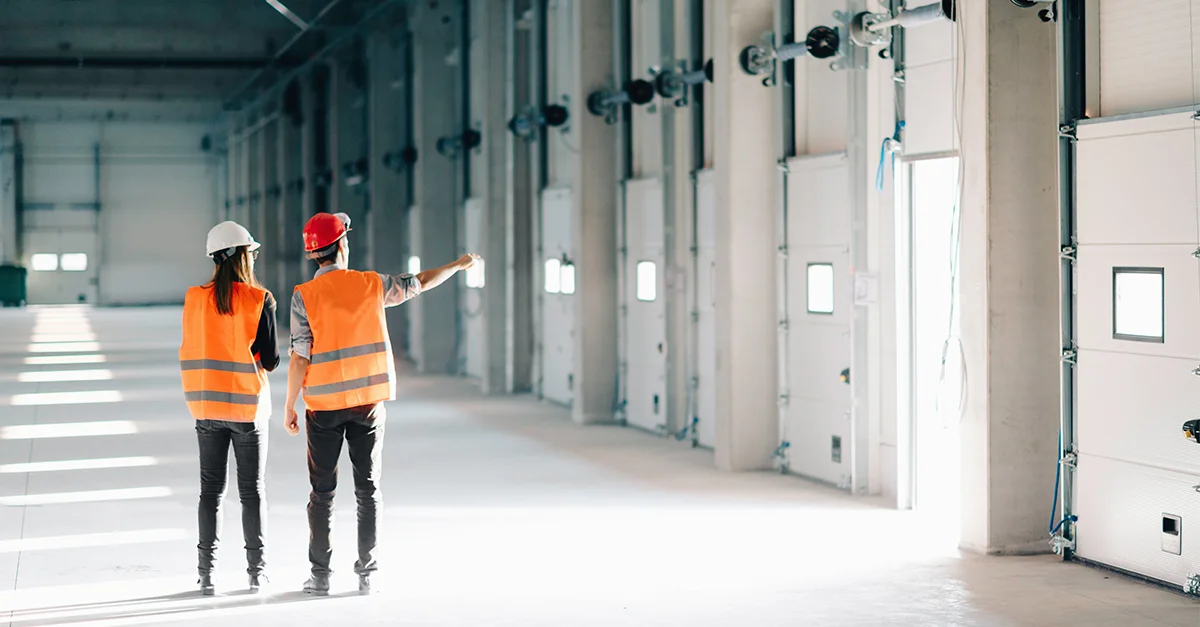 Maintenance manager and technician performing maintenance analysis