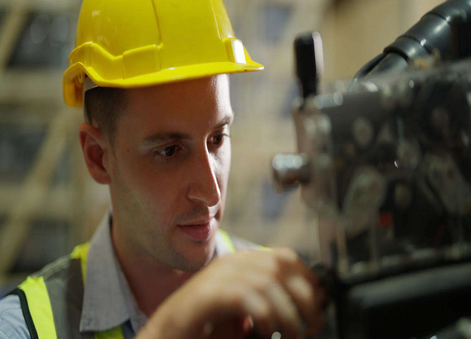 maintenance technician following the proper guidelines to perform his work